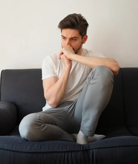 imgi_1_full-shot-man-sitting-couch_11zon-1-1024x683